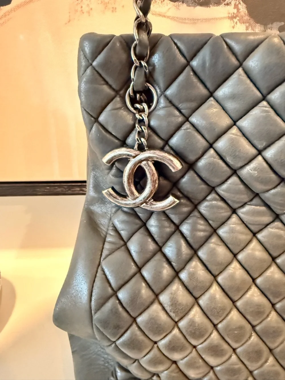 CHANEL Black Quilted Leather Shoulder Bag with Chain Strap and CC Charm